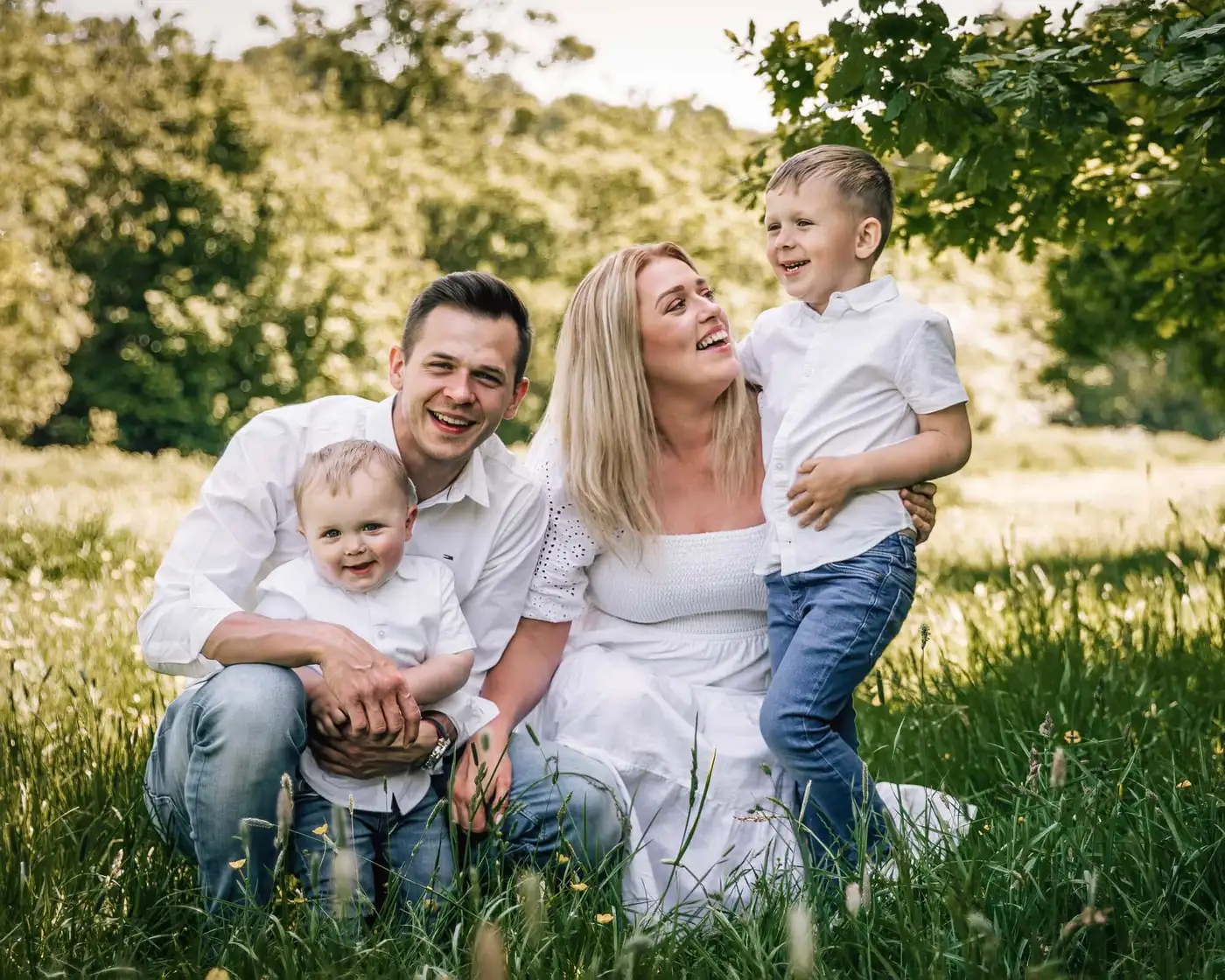 family cuddling during their family photoshoot in leeds