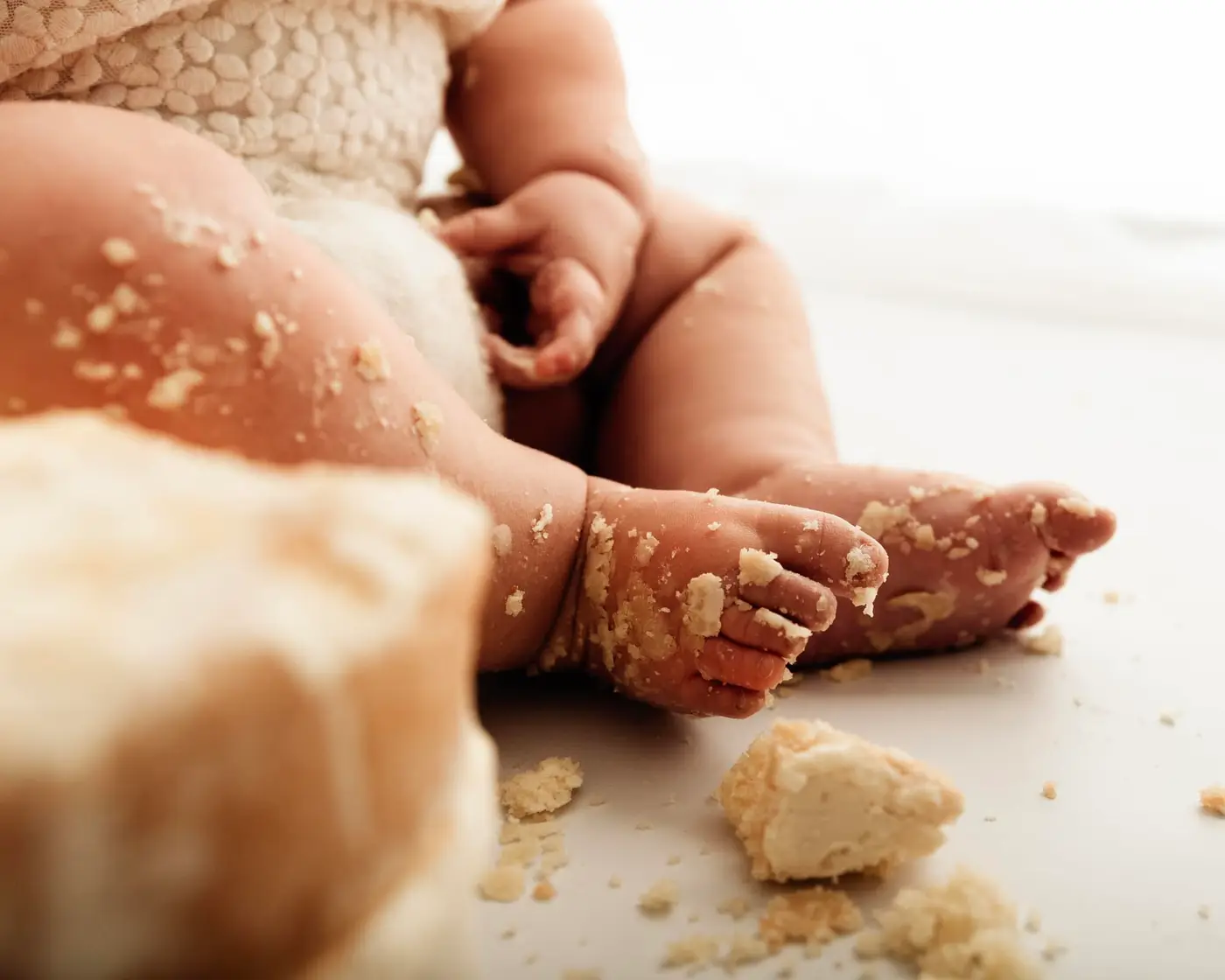 feet covered in cake after a cake smash photoshoot in bradford